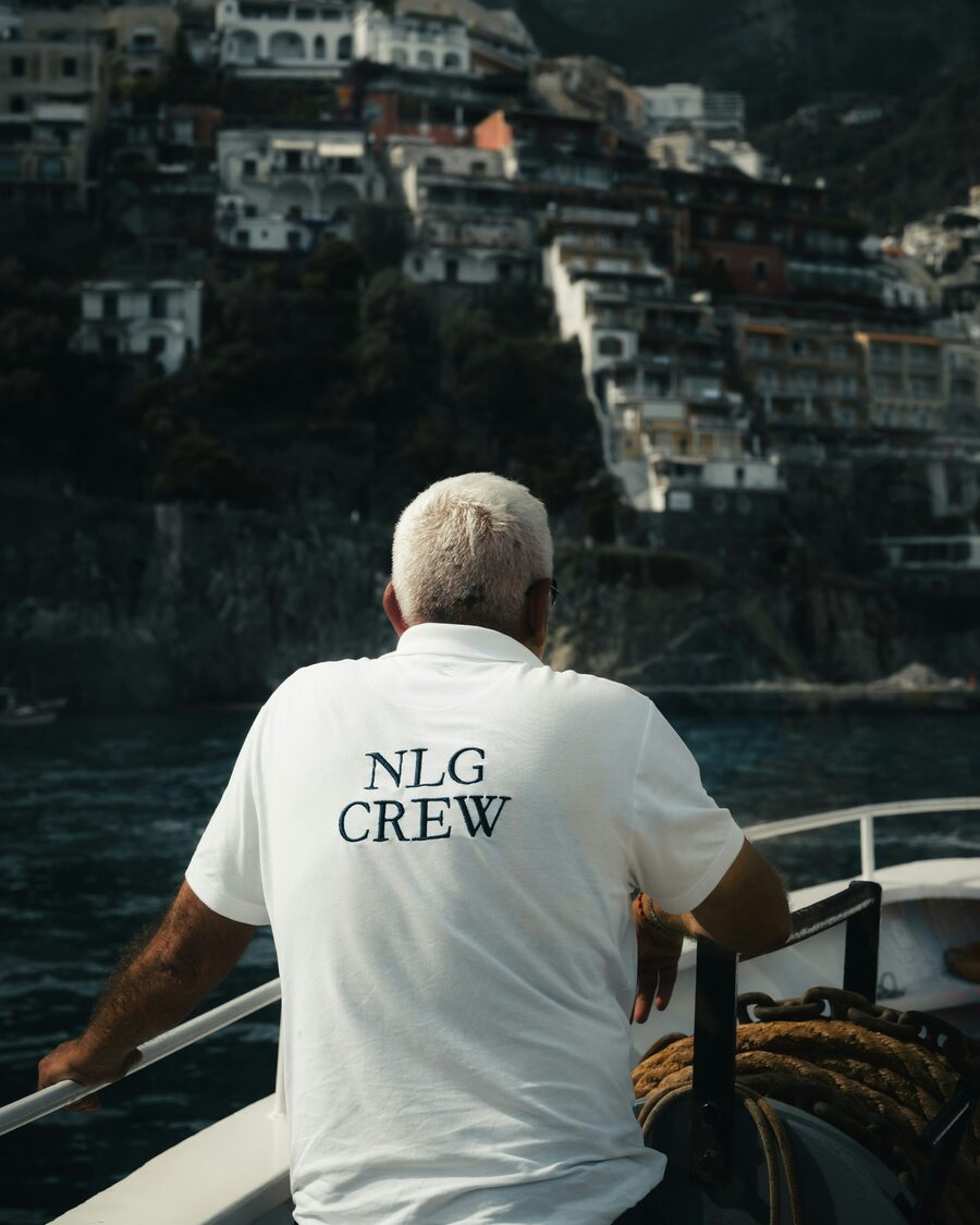 Yacht crew in uniform on deck