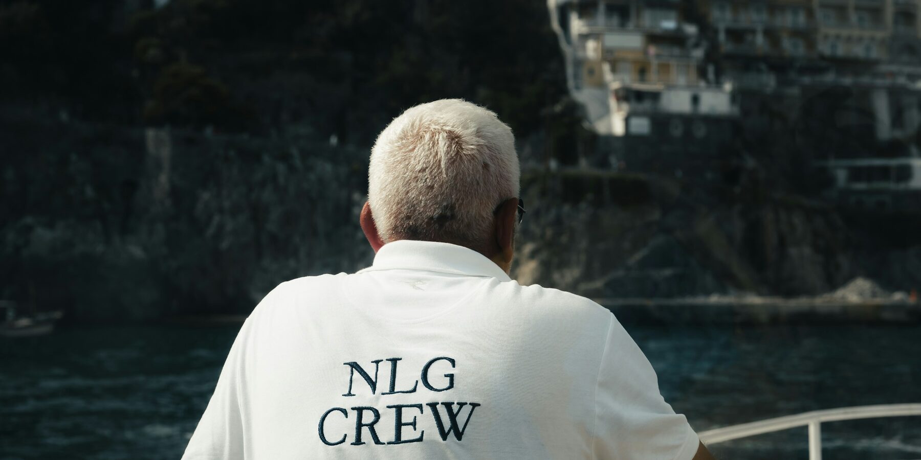 Yacht crew in uniform on deck