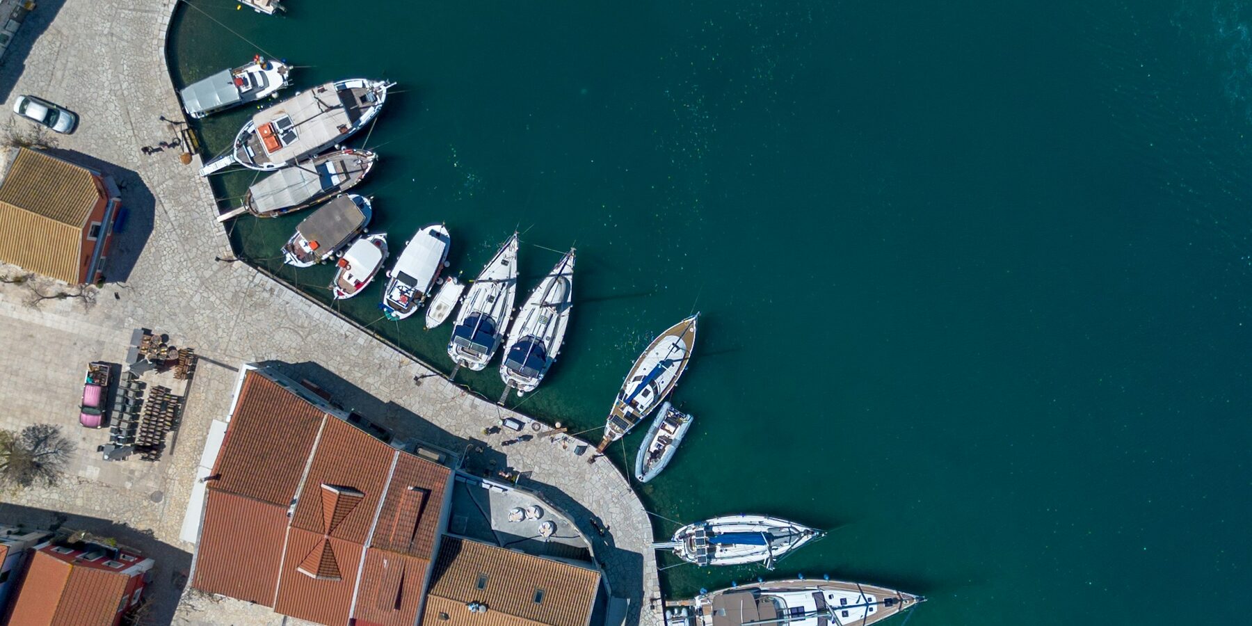 Aerial view of a Mediterranean harbour full of yachts