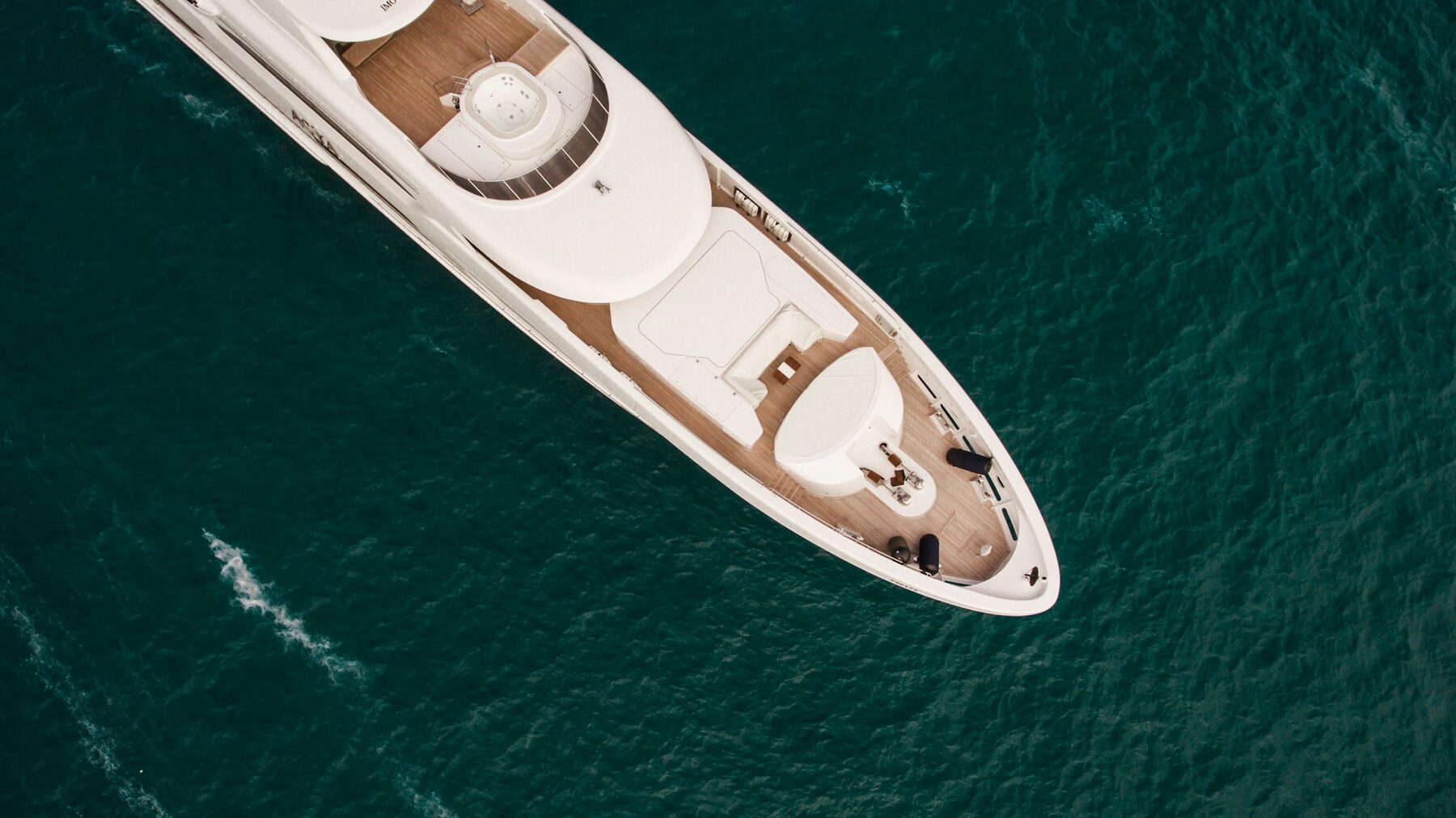 Superyacht viewed from above on open water